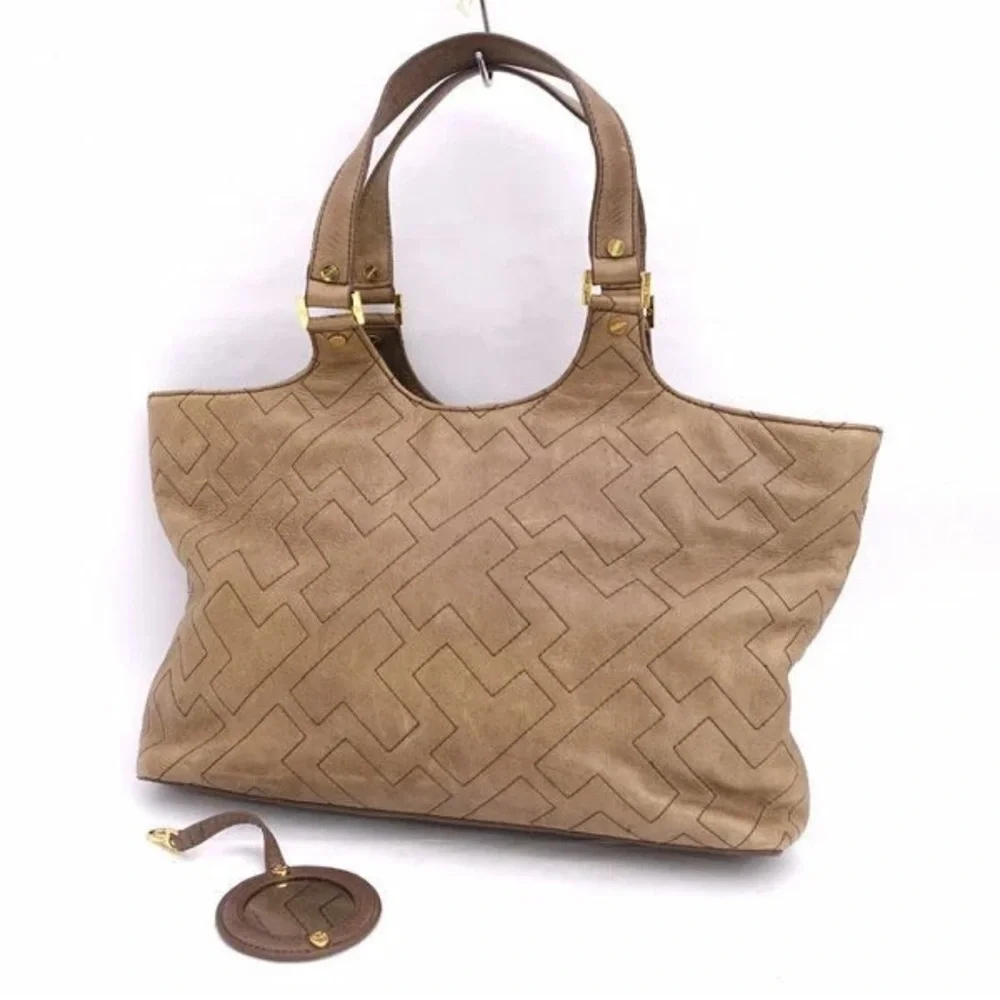 Gorgeous leather Tory Burch zip top Elegant Tan Tote with T stitching
